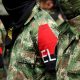 Fotografía de archivo de banderas con el logo del ELN . EFE/Christian Escobar Mora