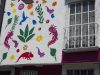 Fotografía de la fachada de un edificio con imágenes de ajolotes este sábado (ayer), en la Ciudad de México (México). EFE/Isaac Esquivel