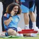Marc Cucurella de España habla por teléfono en un entrenamiento este domingo en Atlanta (Estados Unidos). EFE/ Lavandeira Jr