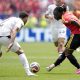 Jeremy Doku (D) de Bélgica en acción contra Yasser Ibrahim de Egipto durante el partido del grupo de la Copa Mundial de la FIFA 2026 entre Bélgica y Egipto, en Seattle, EE.UU. EFE/EPA/STEPHEN BRASHEAR