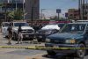 Integrantes de la Policía de México custodian la zona de un crimen este sábado, en Tijuana (México). EFE/Joebeth Terríquez
