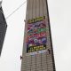 Activistas de Greenpeace México colocan un afiche en la Estela de Luz este martes, en Ciudad de México (México). EFE/Eduardo Guerra