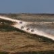 Vehículos militares se desplazan por el sur del Líbano, vistos desde el lado israelí de la frontera en la Alta Galilea, al norte de Israel. EFE/EPA/ATEF SAFADI