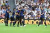 Los jugadores del Inter Legends celebran el gol marcado por su compañero Anderson Hernanes ante el Real Madrid durante el partido Corazón Classic Match que jugadores históricos del Real Madrid e Inter de Milan disputaron en el Santiago Bernabéu. EFE/Víctor Lerena