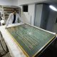El conservador a cargo del Museo Violeta Parra, Pablo Marfan, fue captado este 11 de junio al mostrar una arpillera creada por la legendaria artista y folclorista chilena, en Santiago de Chile. EFE/Elvis González